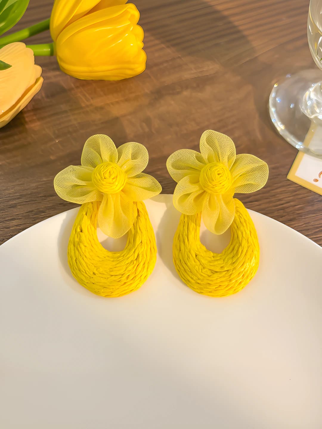 Yellow woven flower hoop earrings