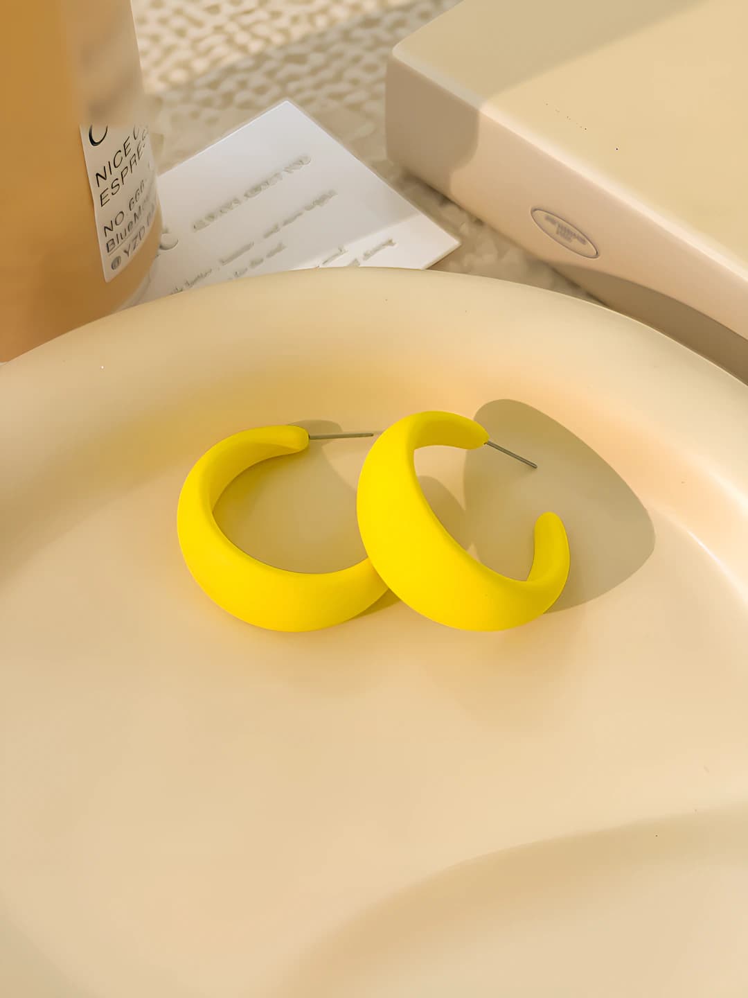 Yellow C-shape earrings