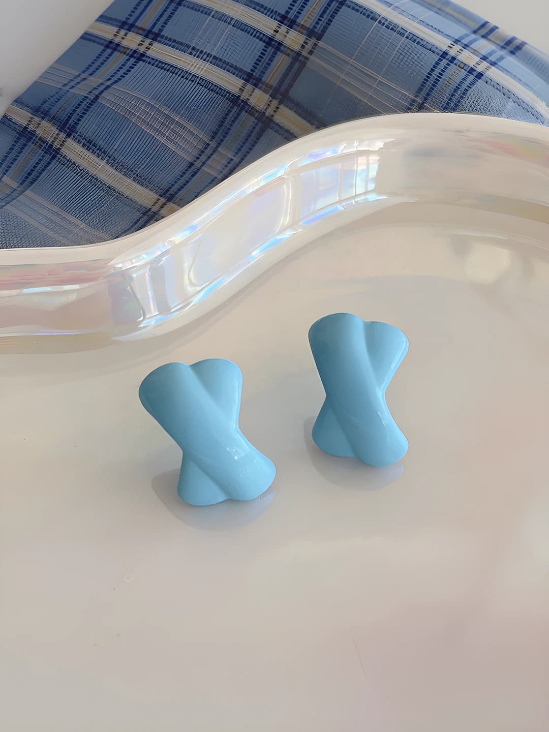 New: Blue crossed studs