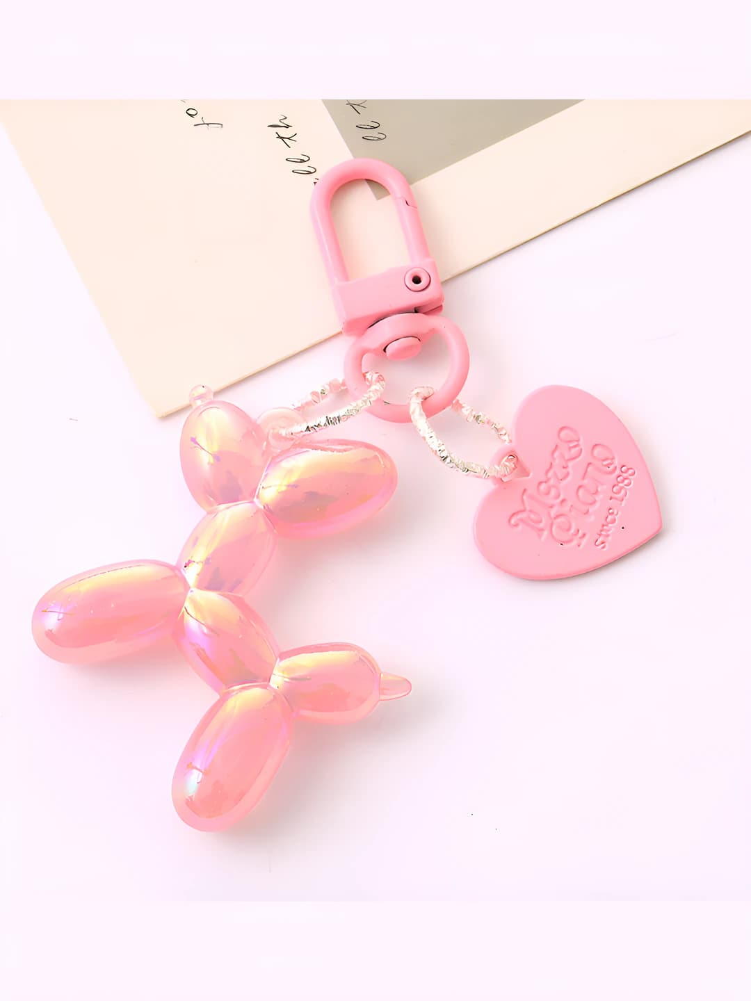 Pink balloon dog charm
