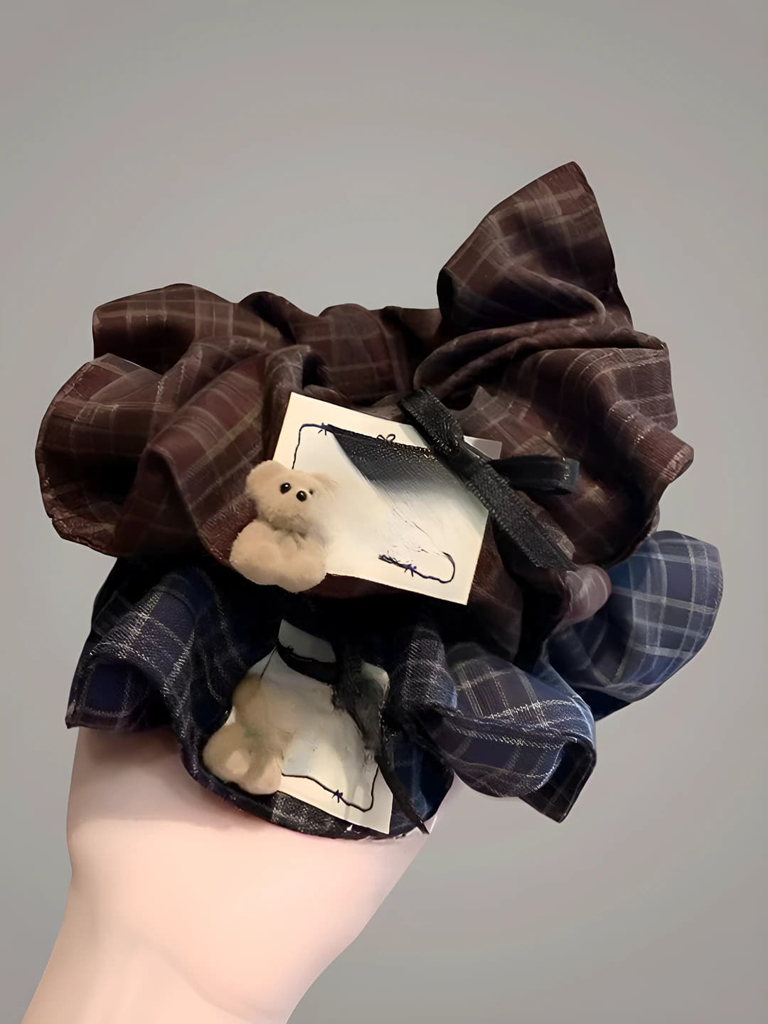 Women's stretch hair ties in preppy style with blue plaid pattern and bear design element