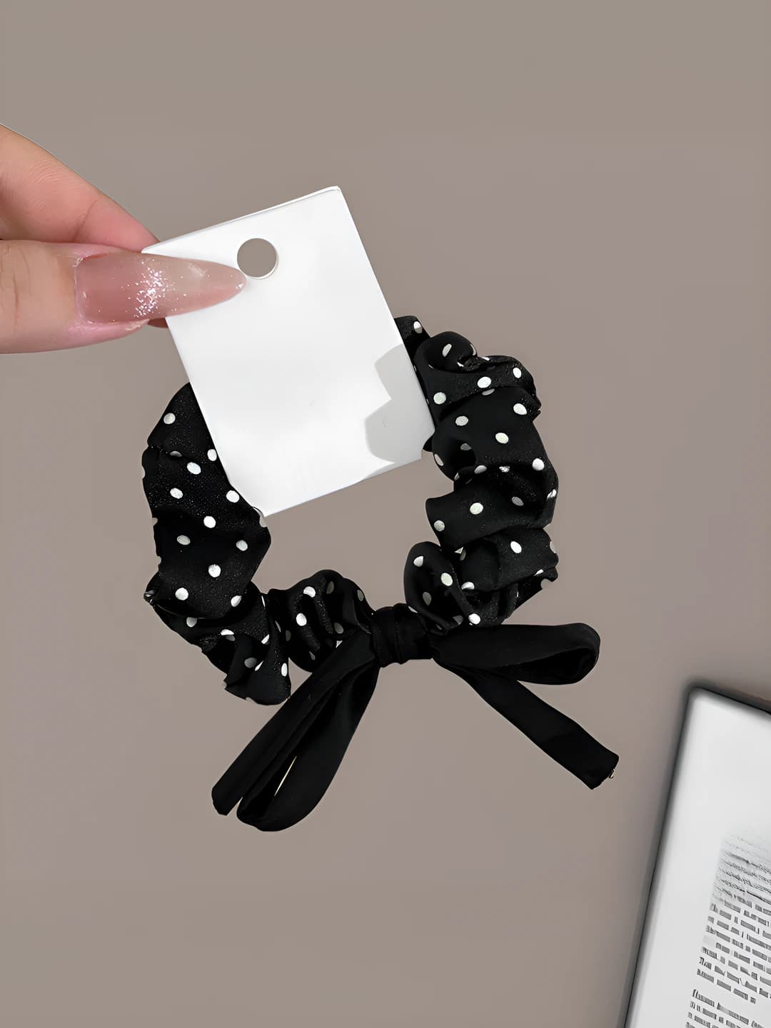 Black polka dot hair tie