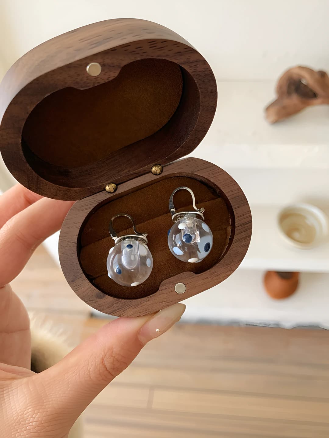 Blue ball ear clip