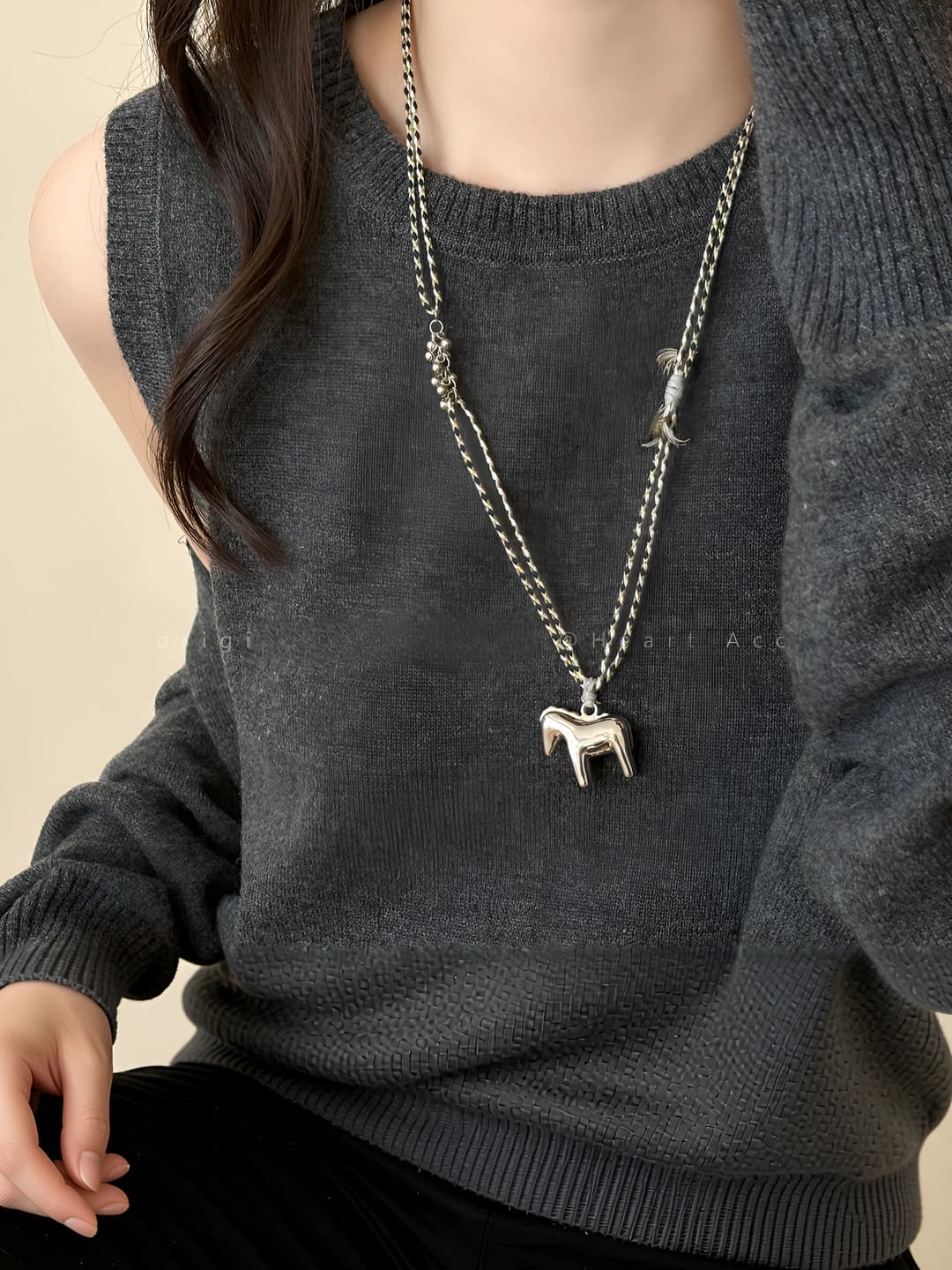 Silver braided cord necklace with pony
