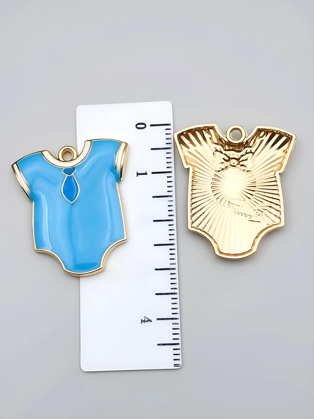 1 teal baby blue tie romper 28x25mm-2.5g