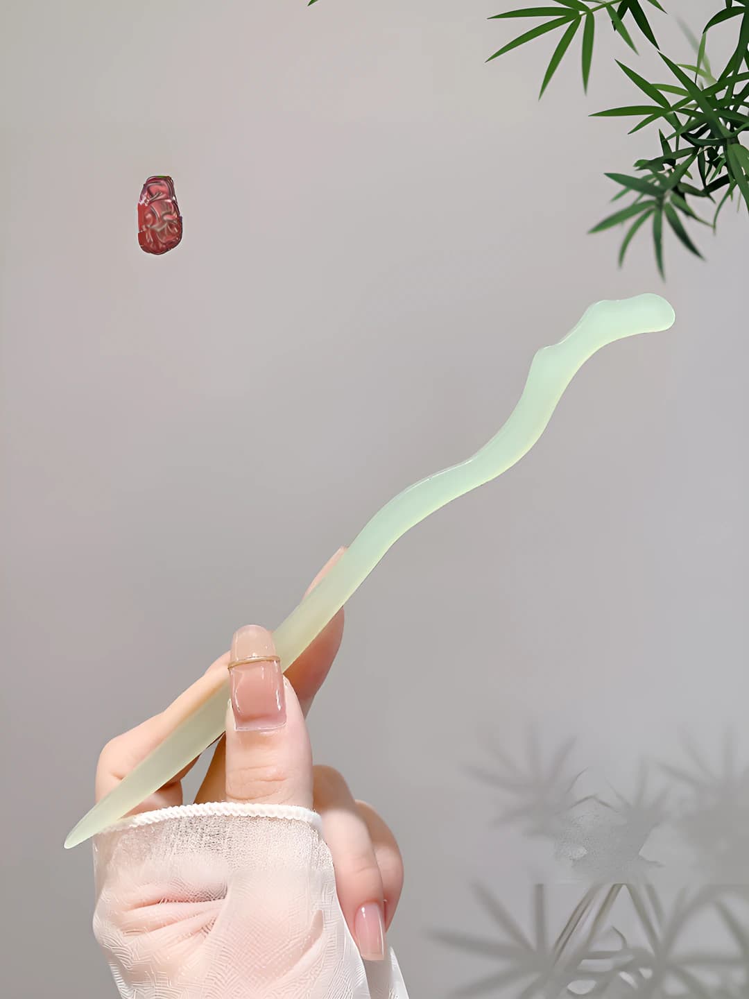 81# Green jade hairpin (in bag)