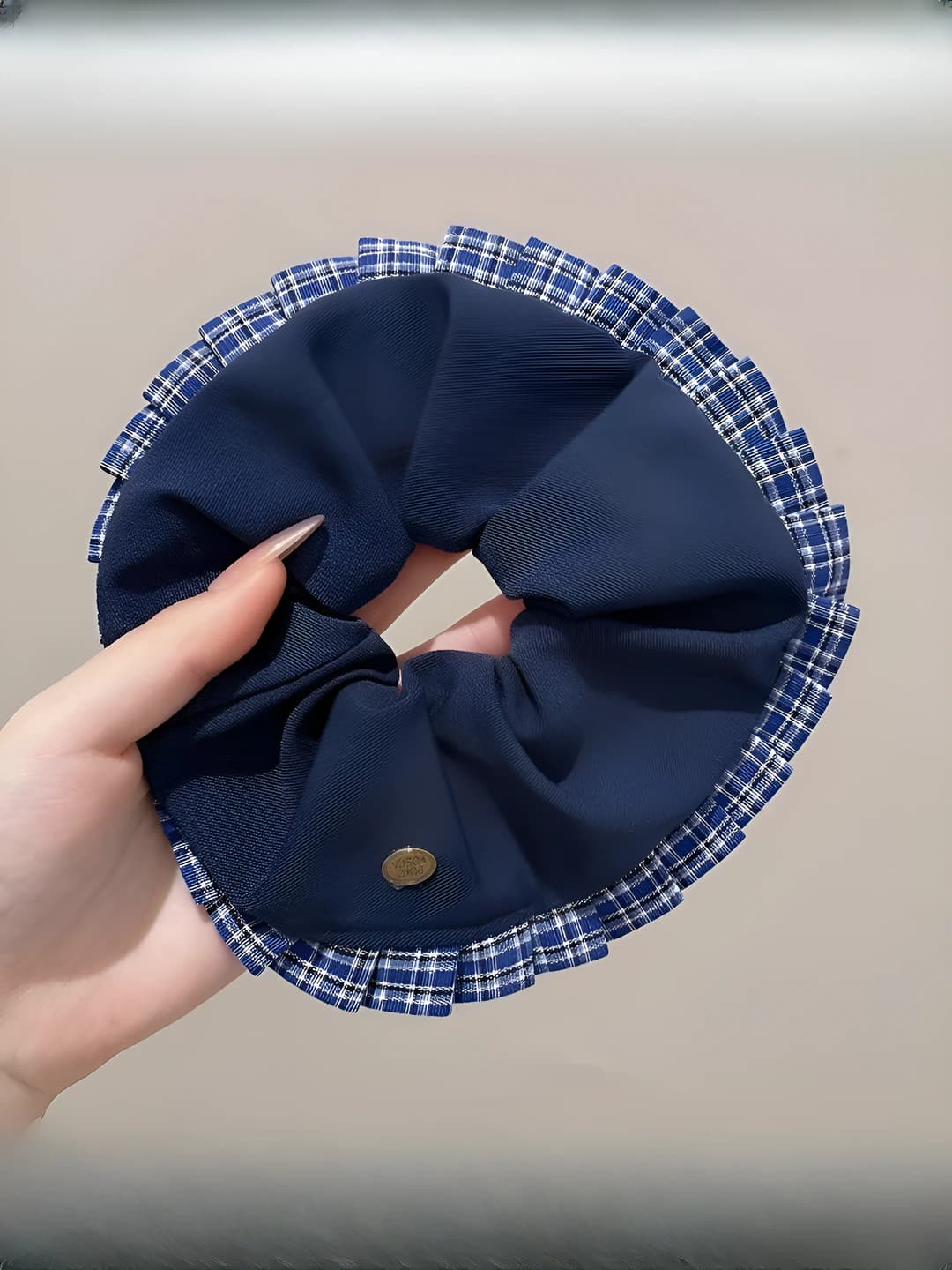Blue scrunchie, plaid edge