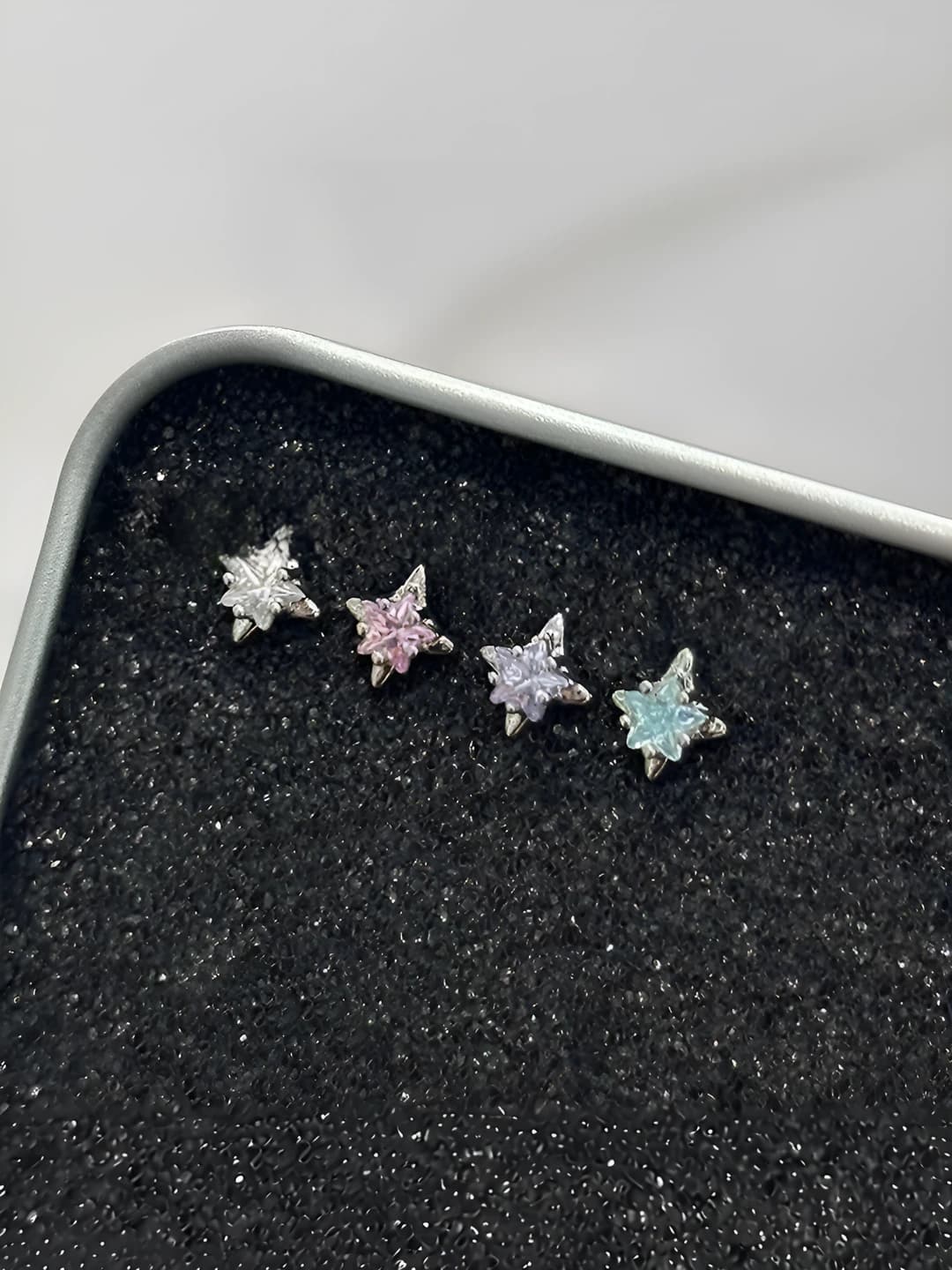 Pink 4-point star titanium 1 pc