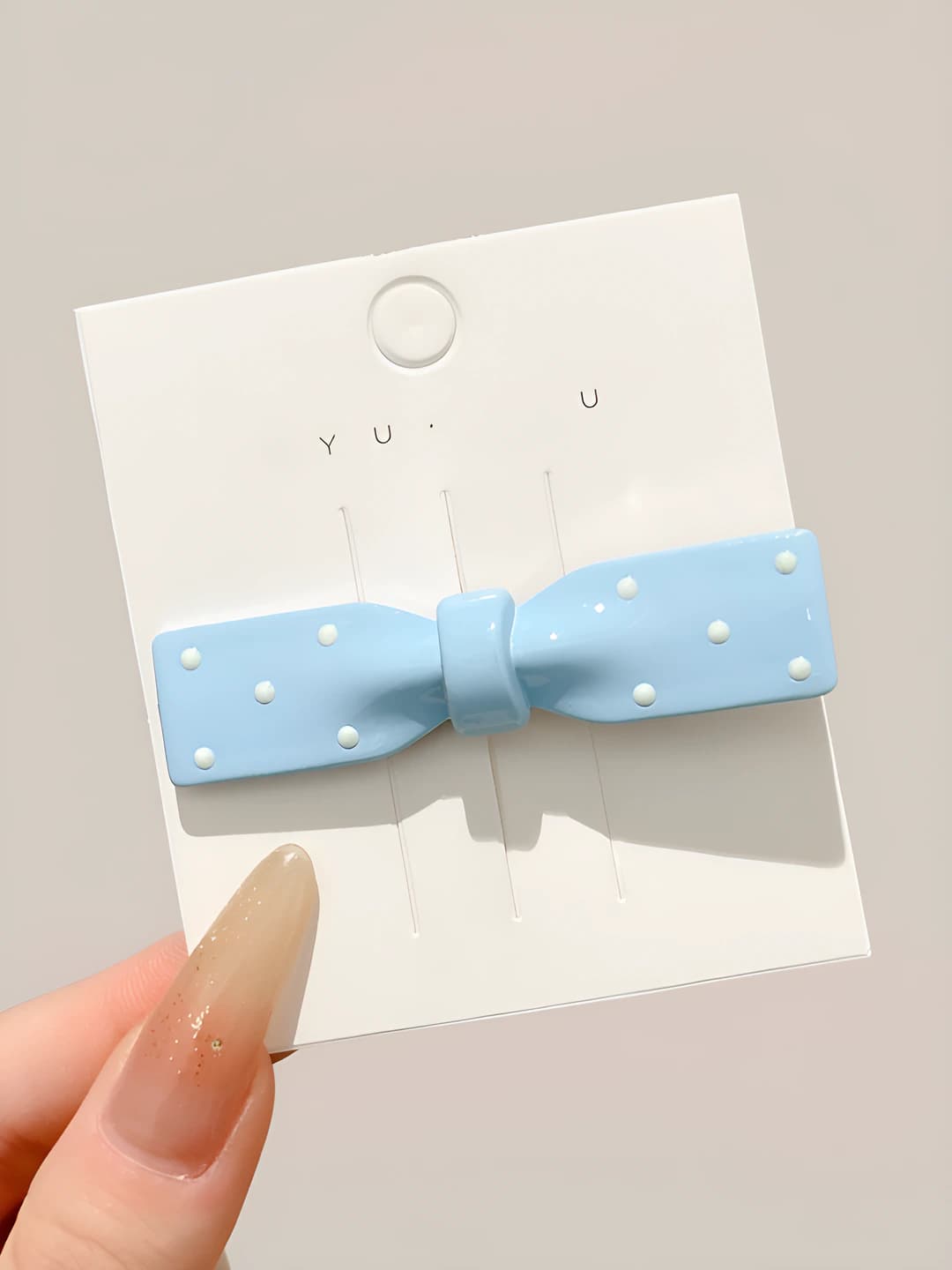 3# Blue bow, oval, ~6.5 cm