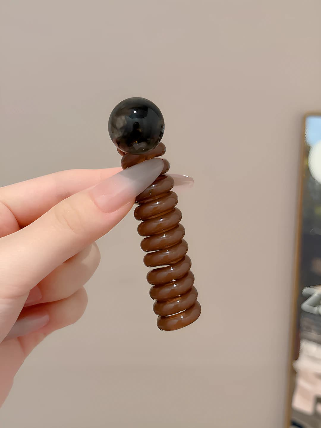 Brown, telephone cord, black pearls