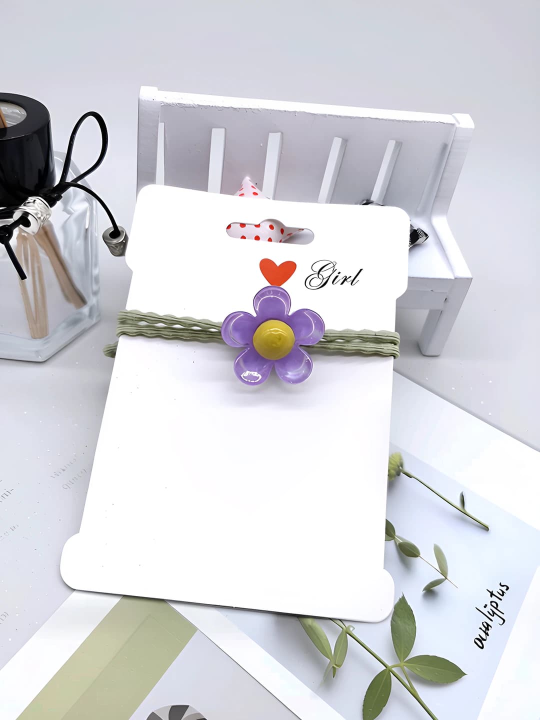 9. Glossy Purple Floral Hair Tie