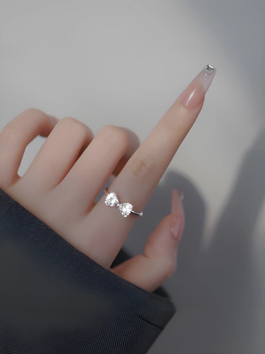 Women's ring: bow shape, copper and zircon, diamond setting, open band, light luxury style