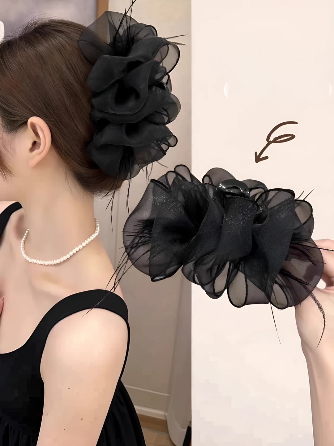 Black mesh feather clip