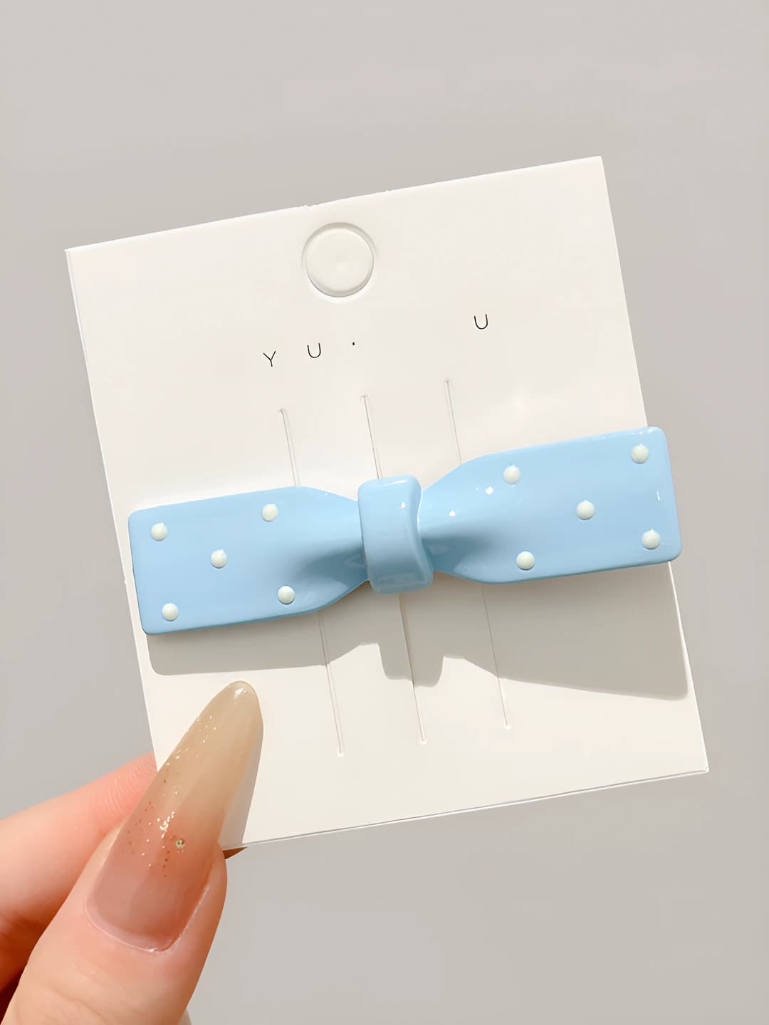 3# Blue bow, oval, ~6.5 cm