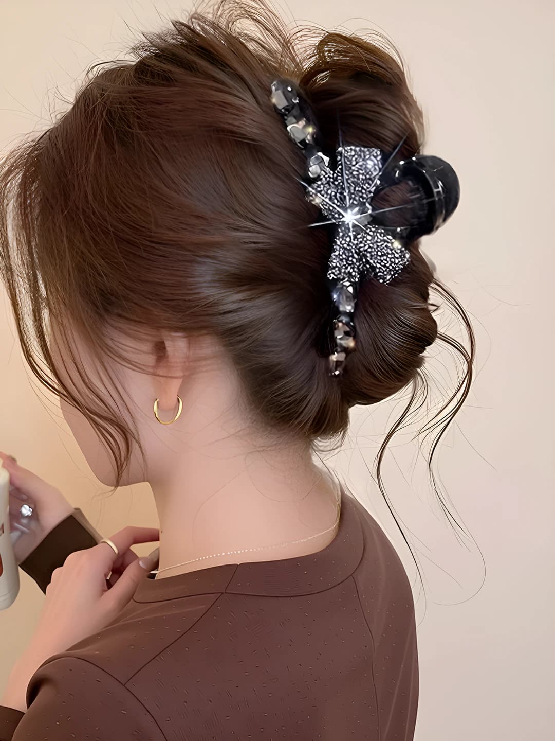 Black rhinestone bow clip