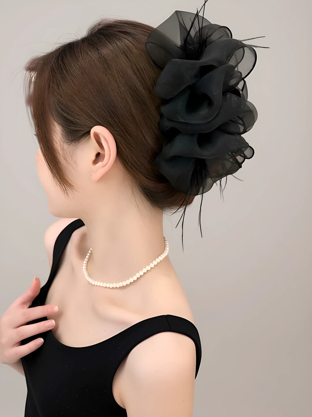 Black, feather and mesh, puff