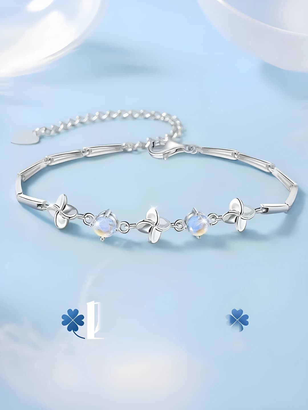 Women's moonstone bracelet with geometric shape, design element: row of diamonds, style: girly