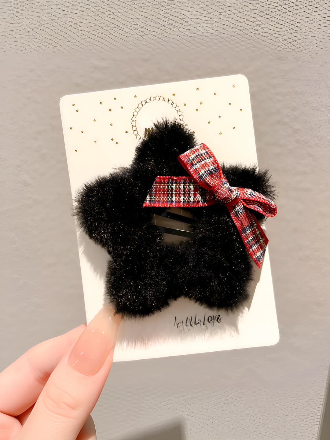 1# Black fluffy star hair clip