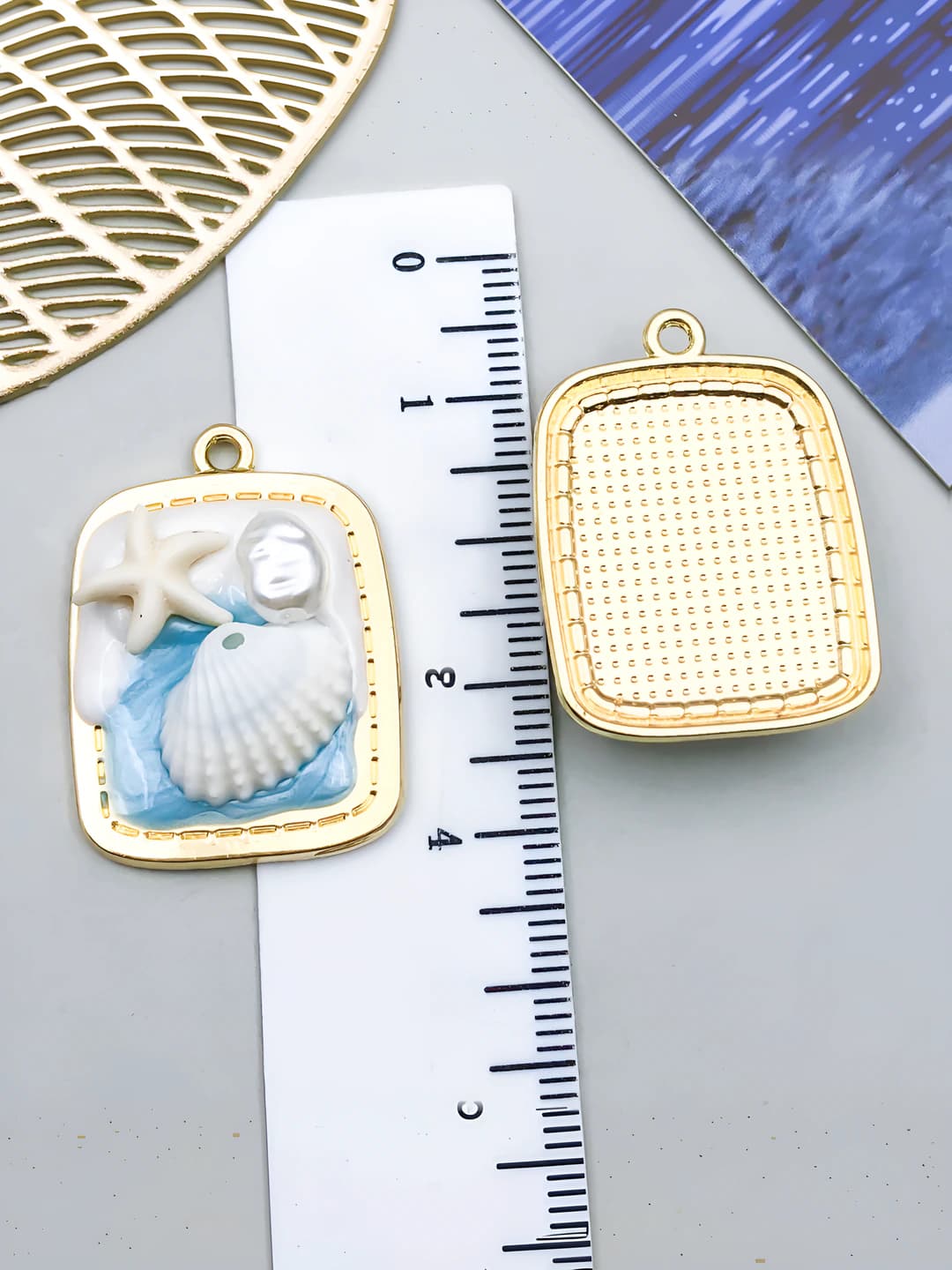 Голубой прямоугольный жемчужный с золотом 30x22x7mm-3.55g