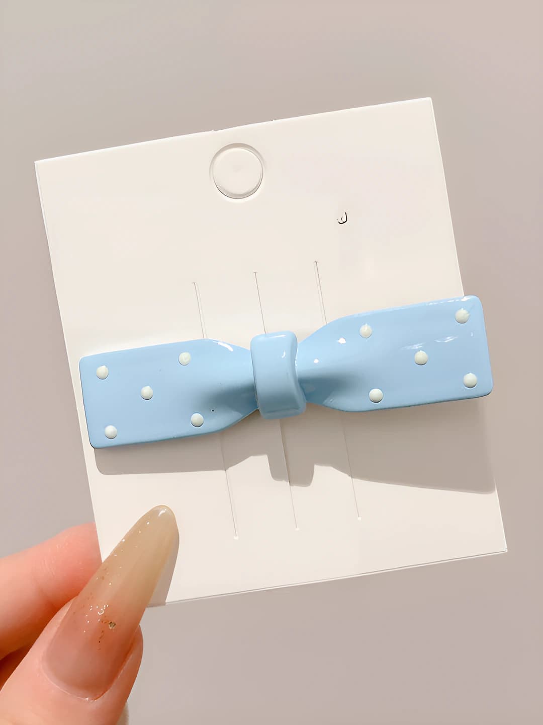 3# Blue bow, oval, ~6.5 cm