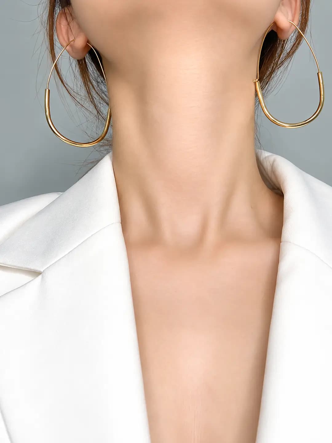 Women's minimalist gold-plated brass oval hoop earrings