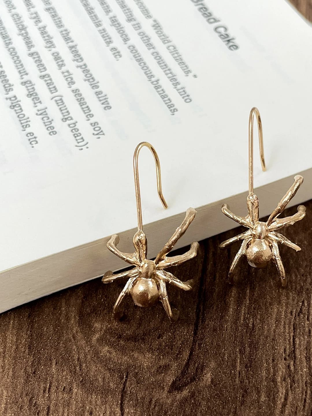 Gold spider earring