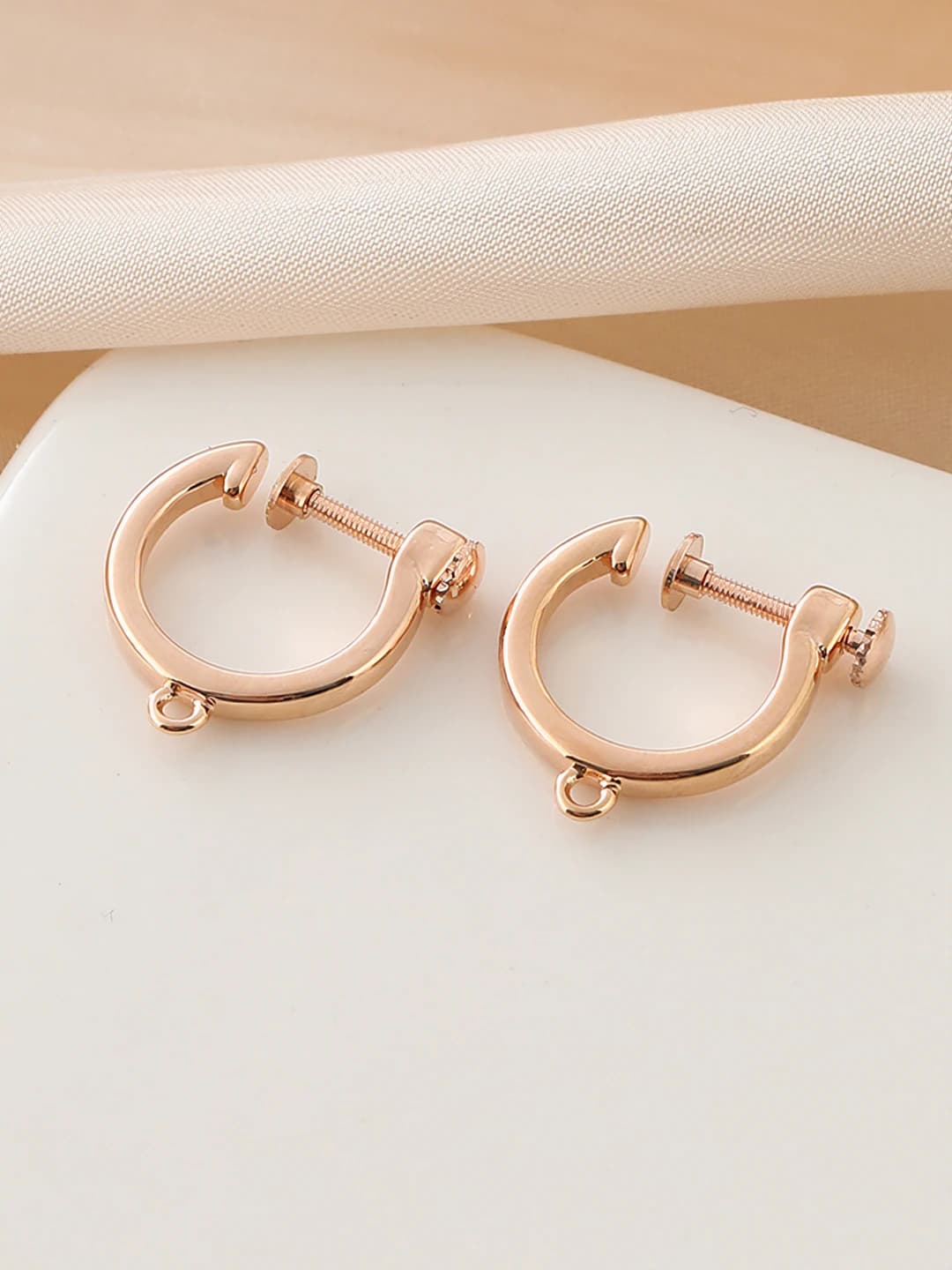 No piercing. Screw ear clips. Champagne gold