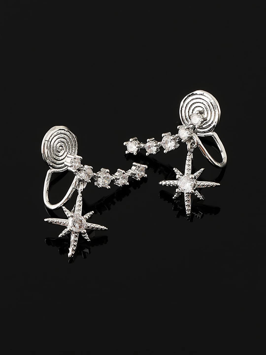 No pierced ears. Spiral clip. White gold