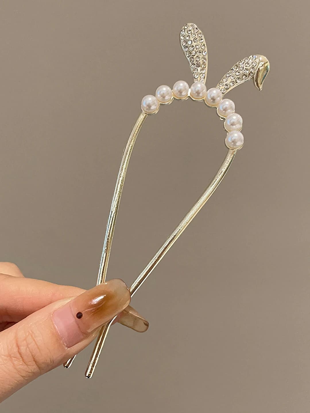 4# Gold bunny ears pearl
