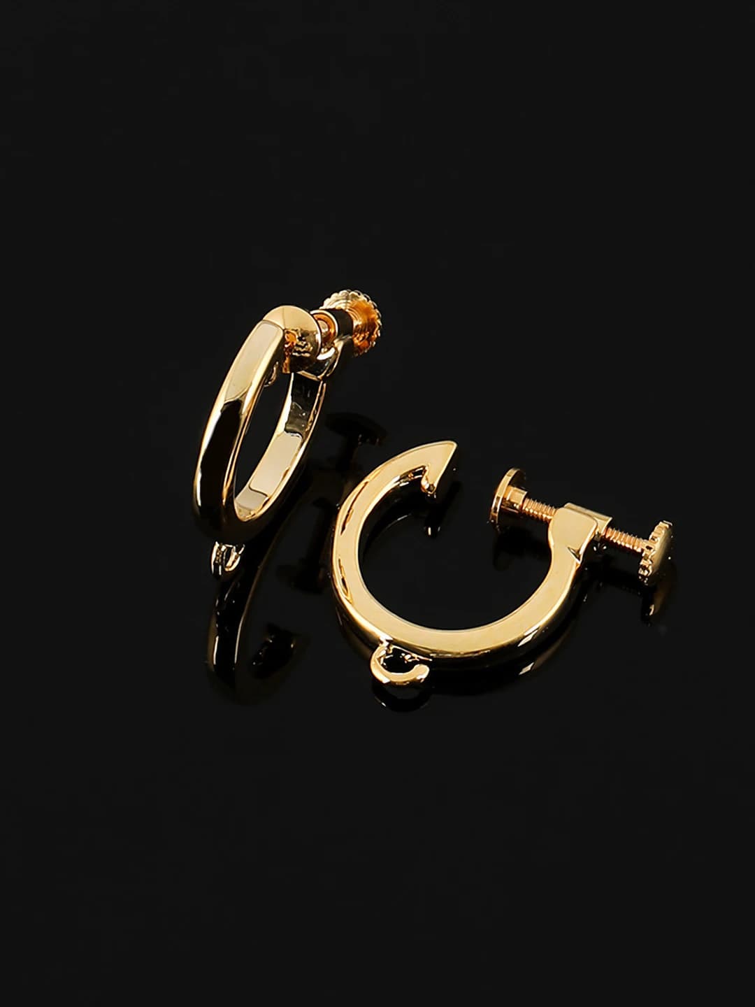 Women's spiral hoop ear clip earrings with geometric design