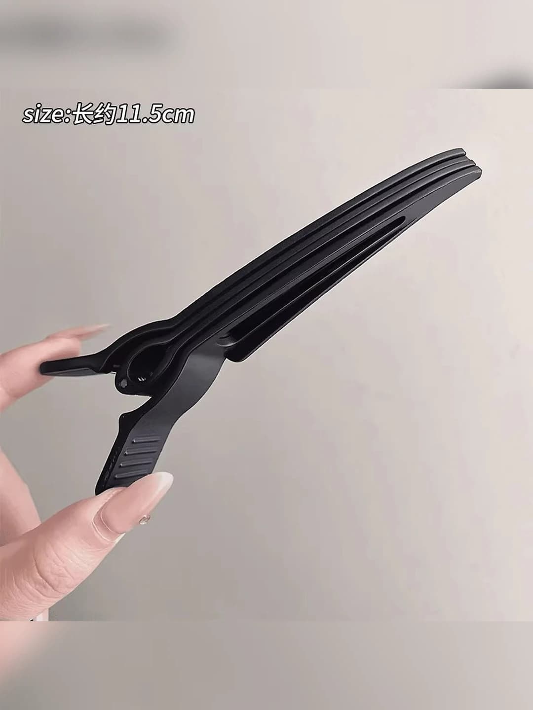 2# Black volumizing clip 11 cm