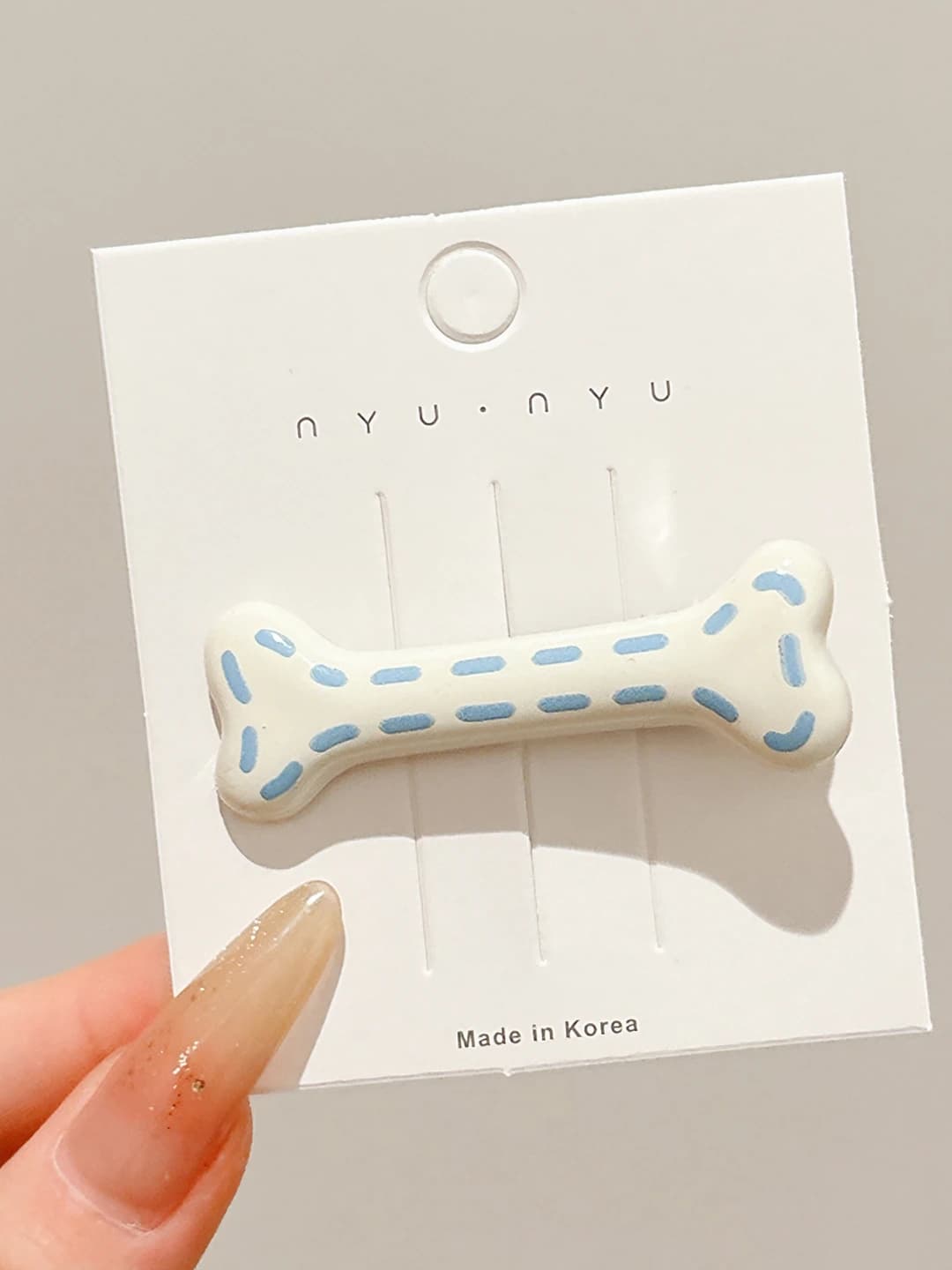 2# Off-white bone clip ~5.5 cm