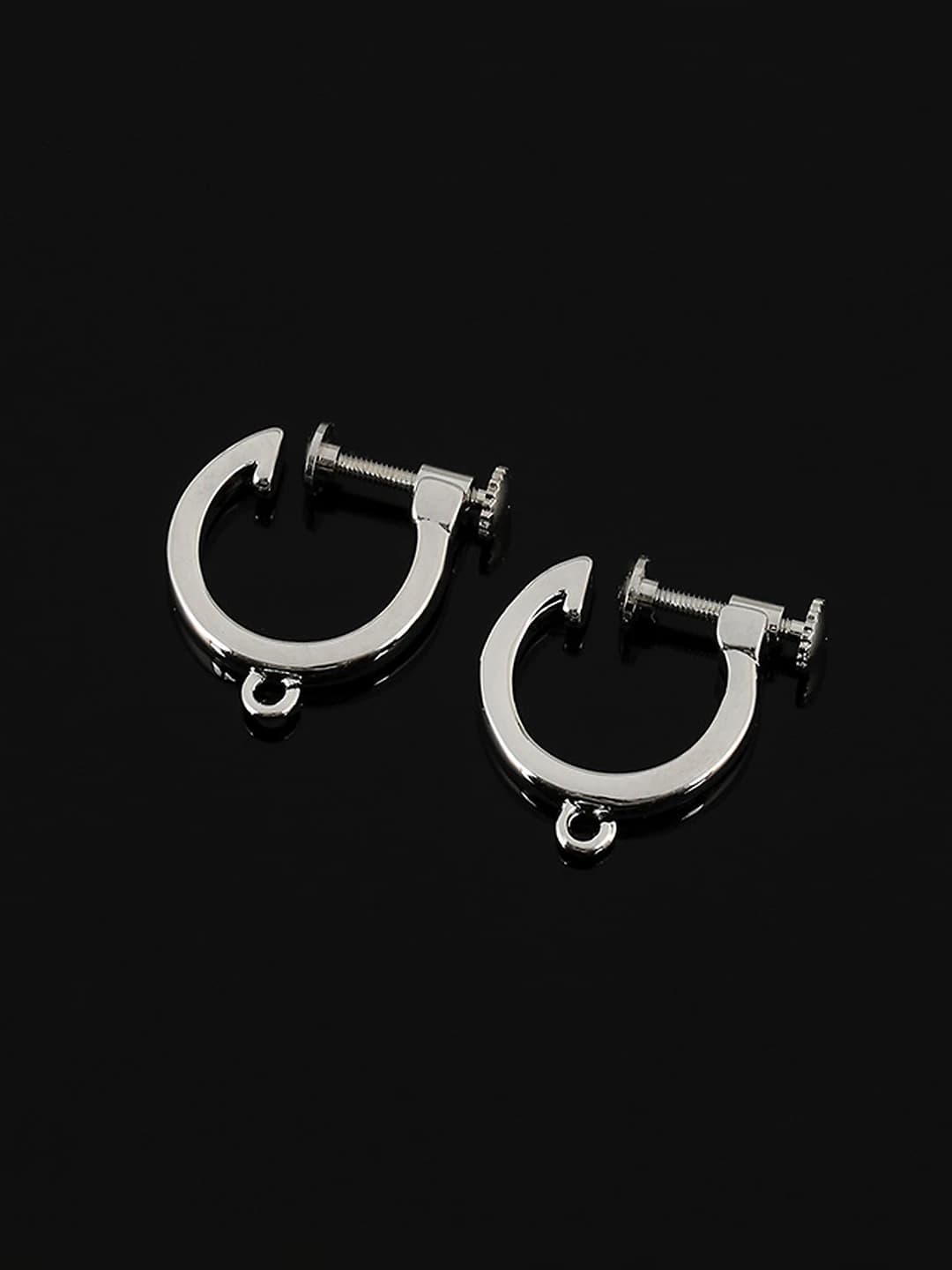 No piercing. Screw ear clips. White gold