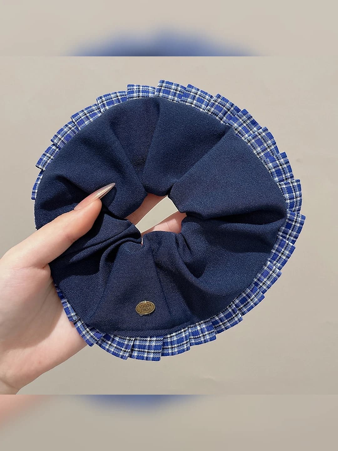 Blue scrunchie, plaid edge