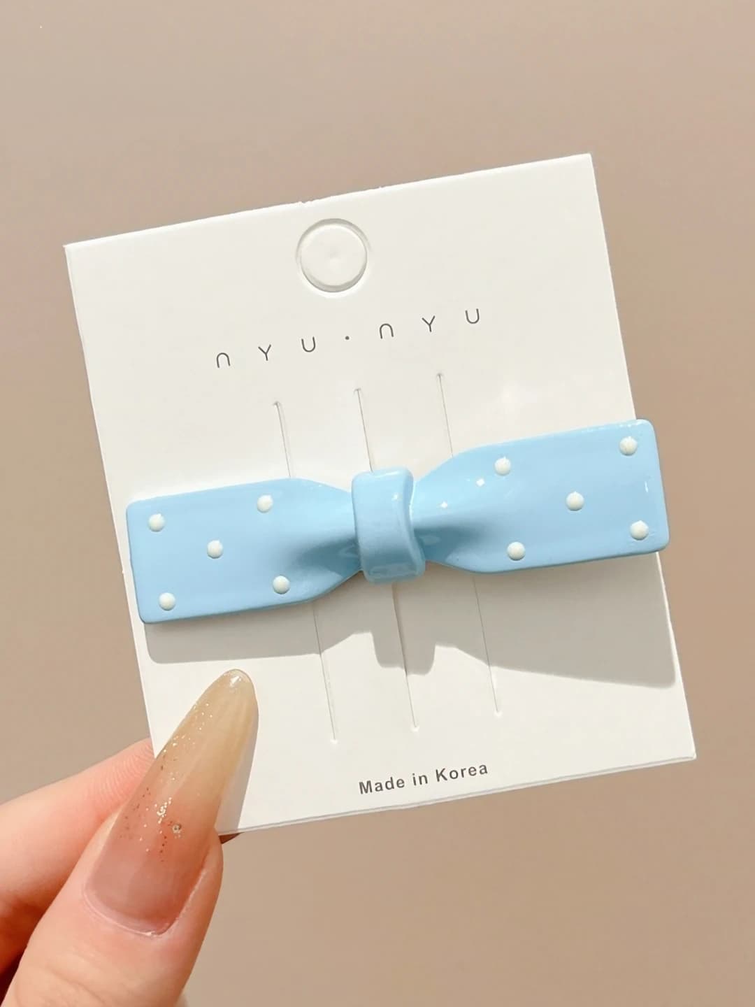 3# Blue bow, oval, ~6.5 cm