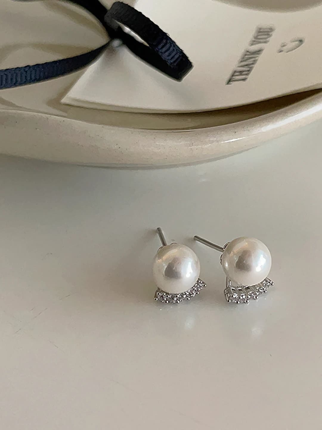 White zircon pearl studs