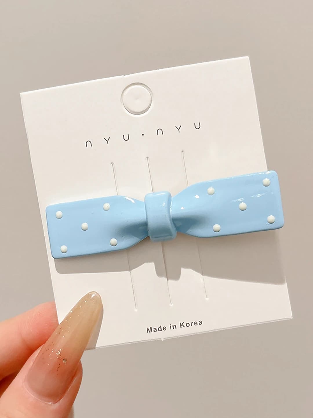 3# Blue bow, oval, ~6.5 cm