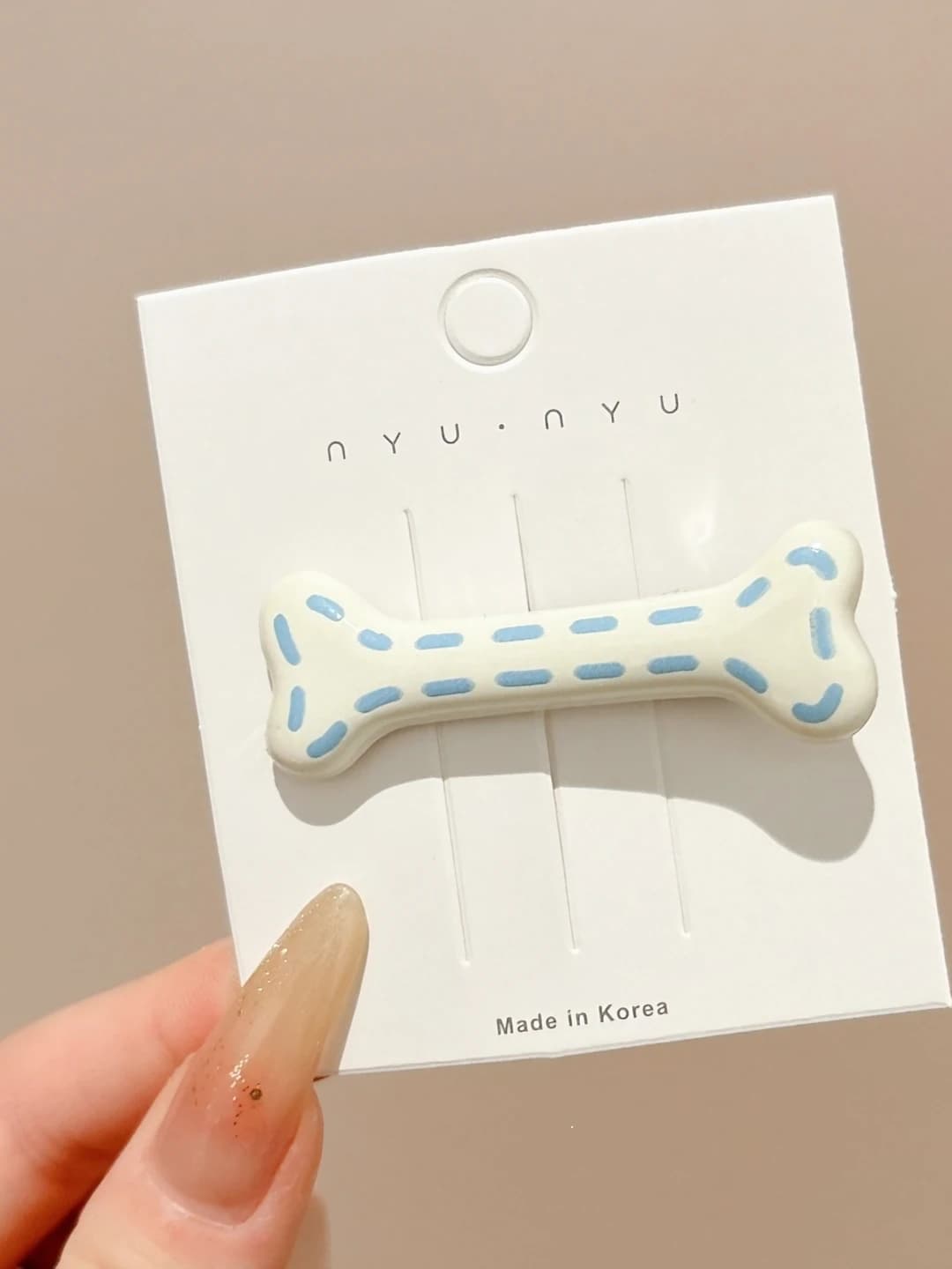 2# Off-white bone clip ~5.5 cm