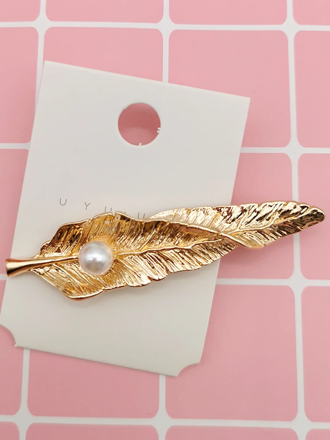 13. Gold leaf, pearl