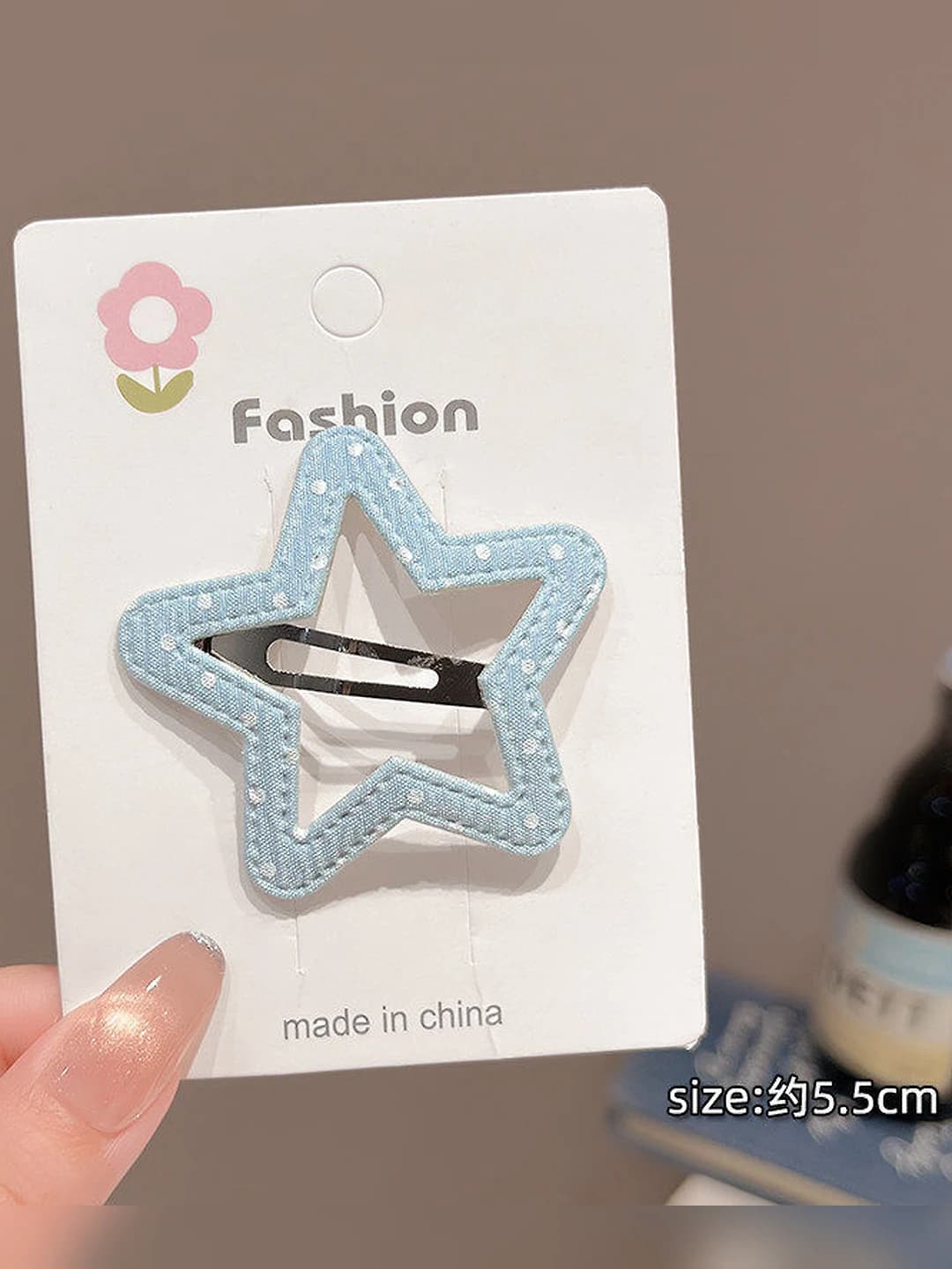 1# Light blue polka dot five-pointed star, ~4 cm