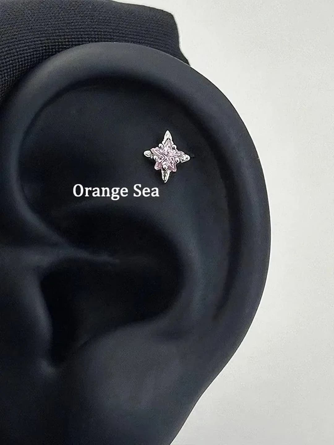 Pink 4-point star titanium 1 pc