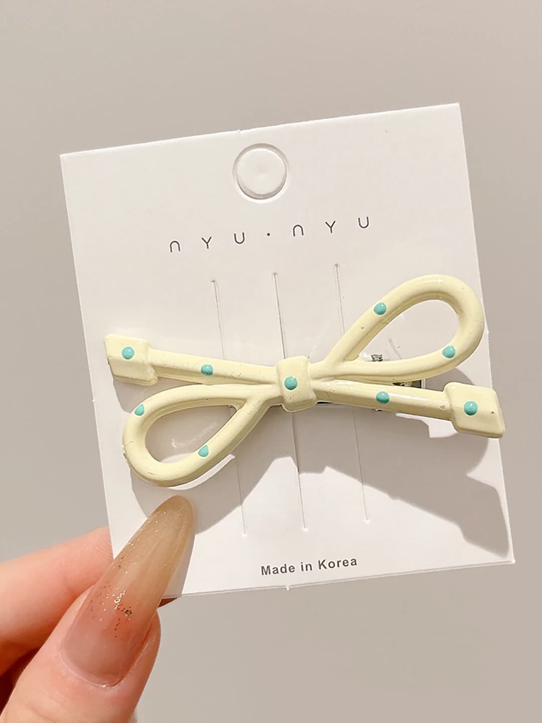 2# Beige bow, ~6 cm