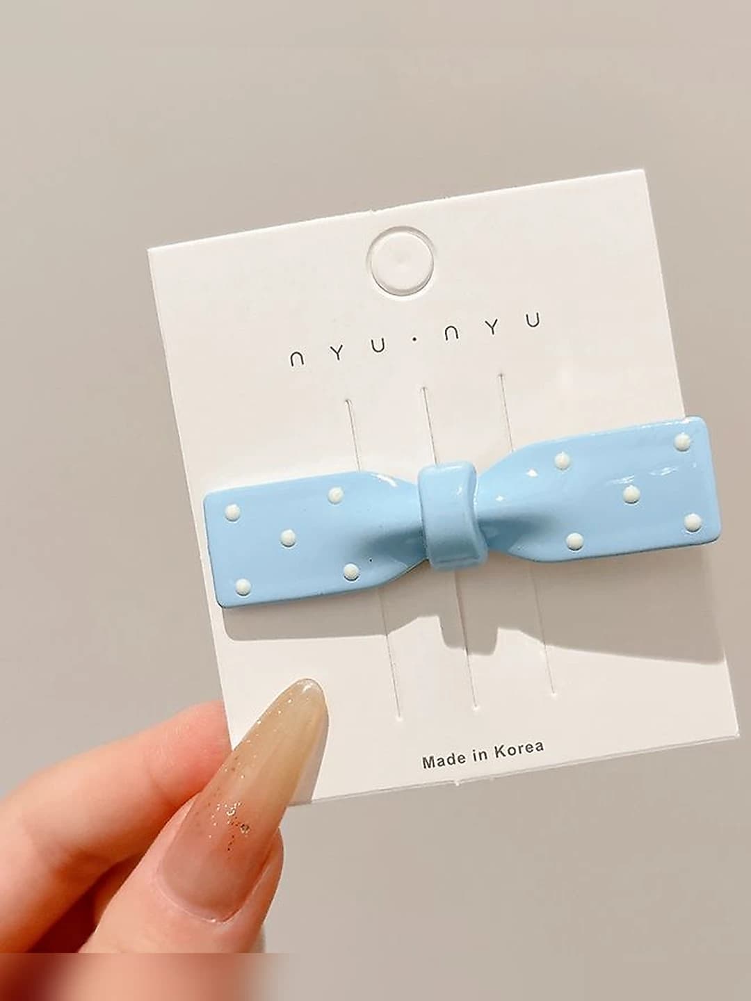 Blue bow oval clip, ~6.5 cm
