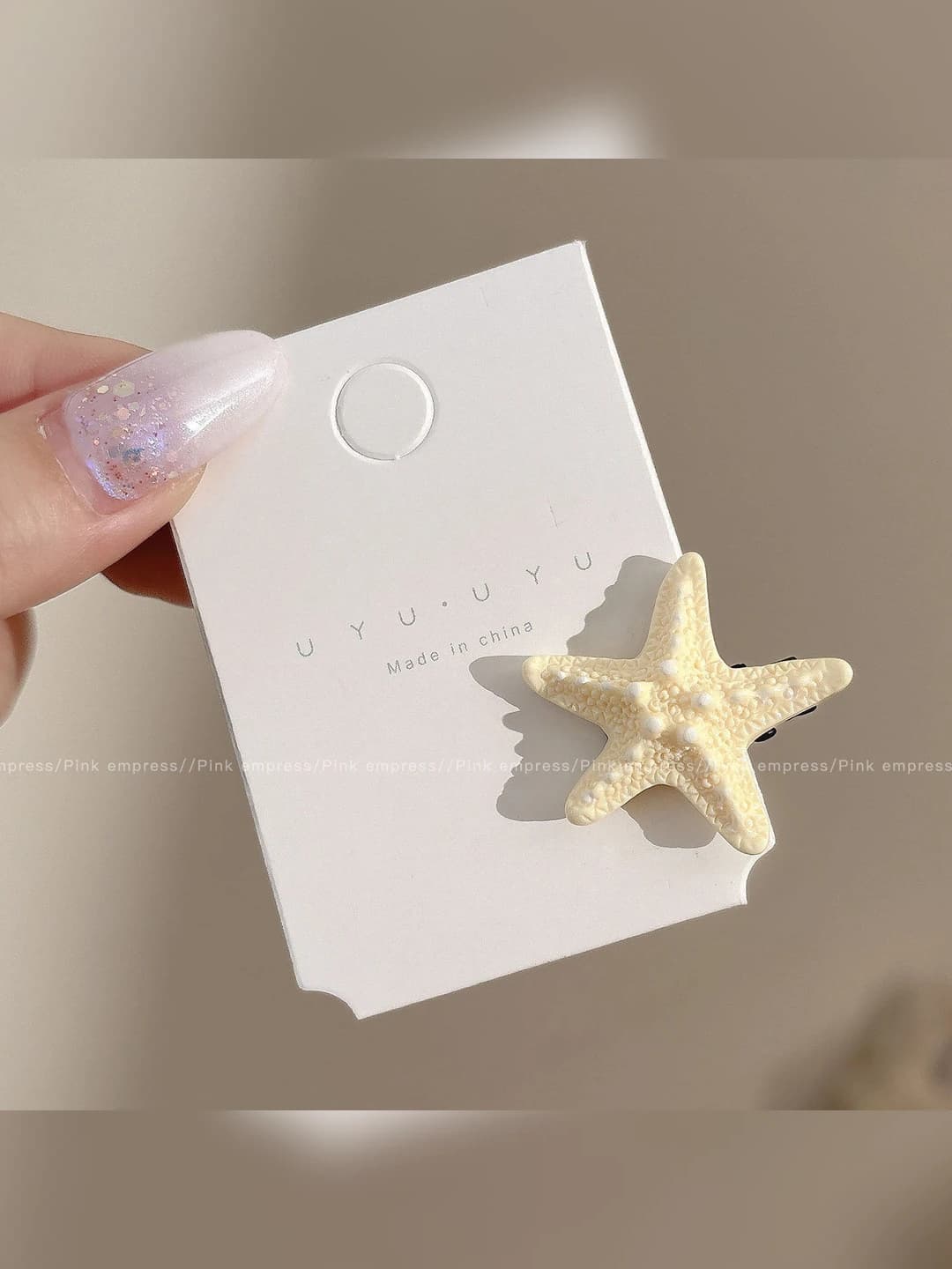 6# Starfish clip - Yellow, base ~2 cm