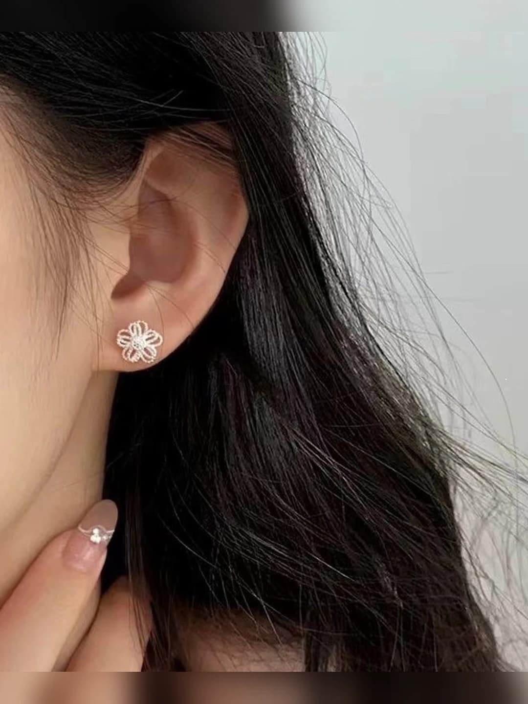 Ear piercing, ~1.5cm