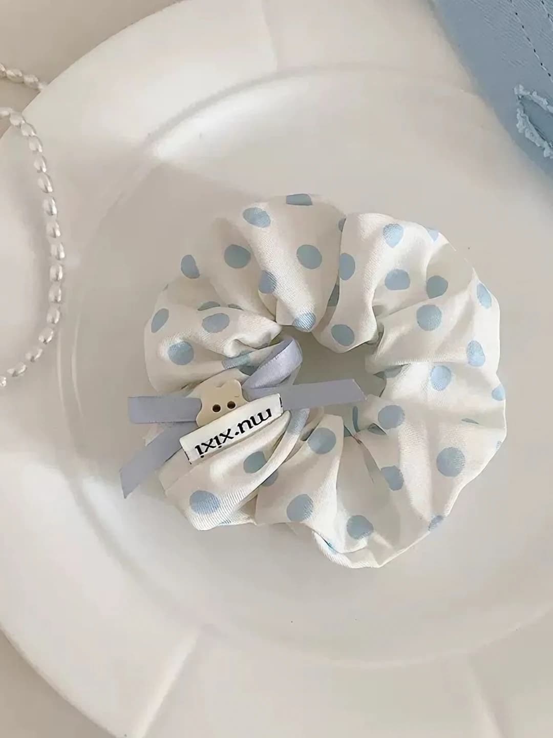 Blue polka dot bow hair tie