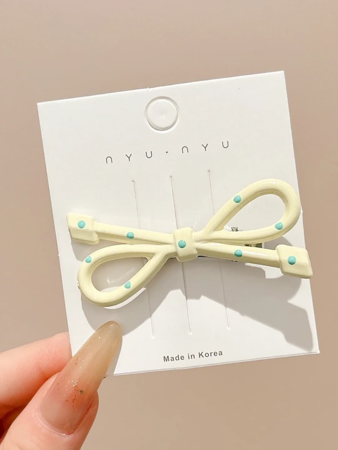 2# Beige bow, ~6 cm