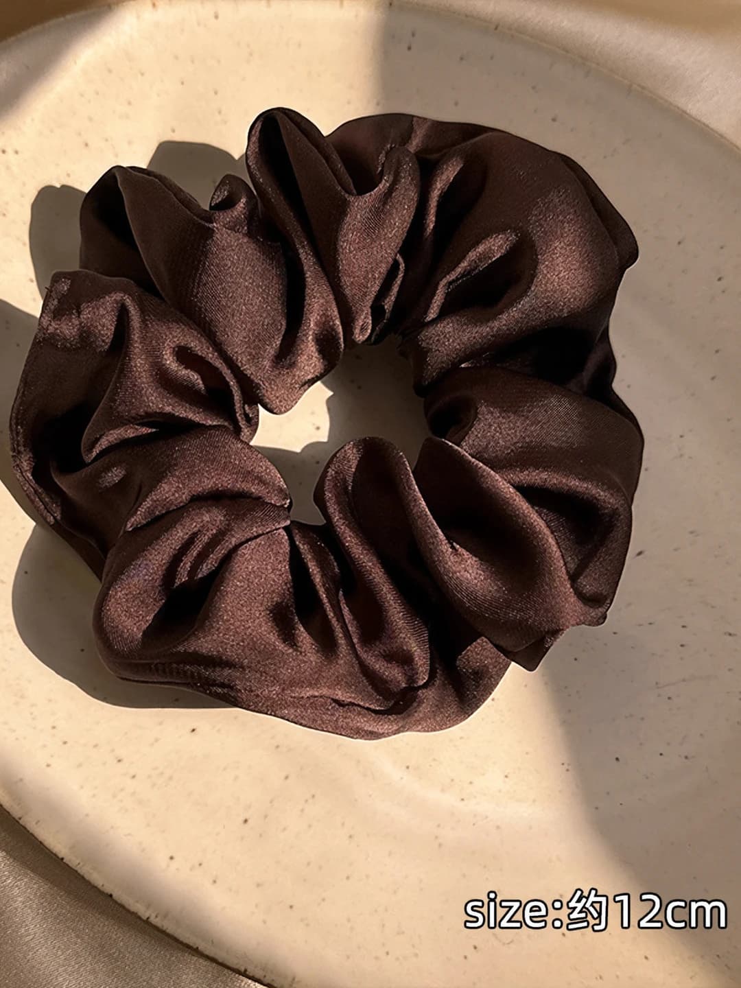 Brown medium hair tie