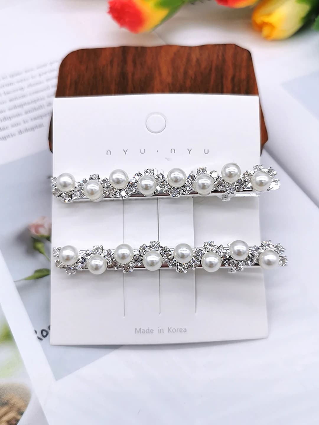 5. 8 pearl and diamond, silver