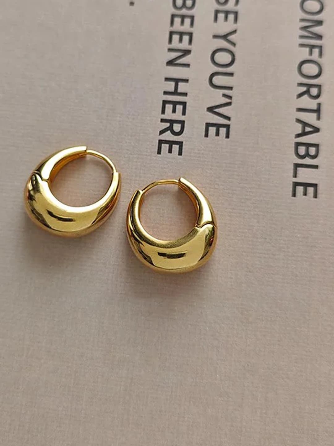 Gold oval medium plain hoop earrings